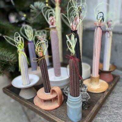 1+1 Design - Lys med fluorescerende tråd i flammen